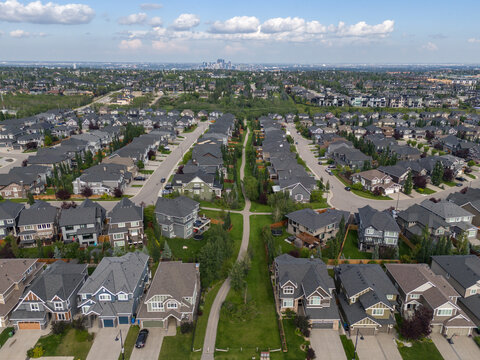 View of homes during the summer in Aspen Estates area of Calgary, Alberta.