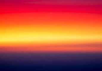 Obraz premium Vibrant sunset sky with a dramatic gradient of red, orange, yellow, and purple