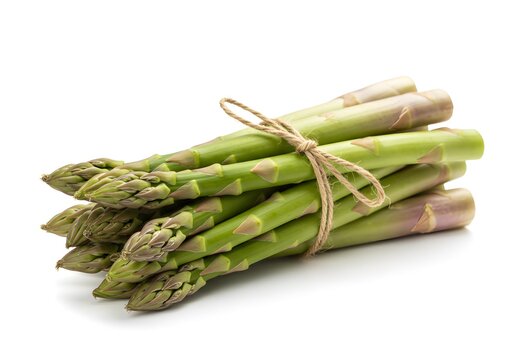 Fresh green asparagus spears tied with twine against white background perfect for healthy eating campaigns and vibrant spring recipe promotions