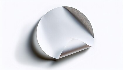white circular sticker with peeling corner isolated on white background with curled edge