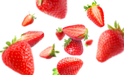Yummy fresh strawberries swirling in air against white background