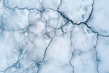 Aerial view of frozen lake with crack patterns, top-down icy texture, natural winter scene, minimal style.