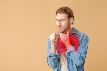 Ill young man on color background