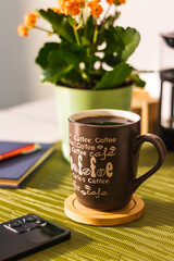 Mug with the words Coffee Coffee Cafe written on it