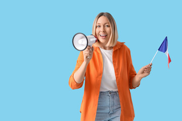 Female French language teacher with flag and megaphone on blue background