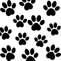Seamless pattern of black dog paw prints in a scattered arrangement silhouette isolated on transparent background