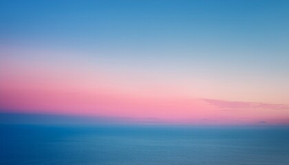 Fototapeta premium a pink and blue semi toned gradient creates a soft background