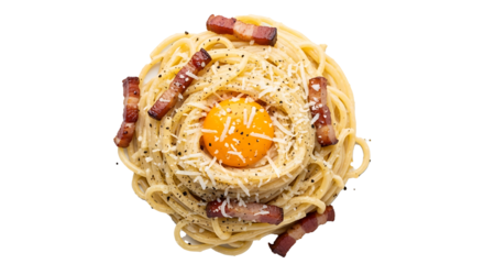A top down view of spaghetti carbonara with bacon and egg yolk on a black background in a studio shot on transparent background