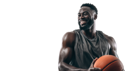 Smiling male basketball player holding a ball, focused on training and fitness.