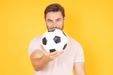 Man hold football ball. Sport victory. Excited man holding soccer ball in studio. Football fan showing football ball. Soccer coach. Supporter celebrating football success. Big sport lottery win.