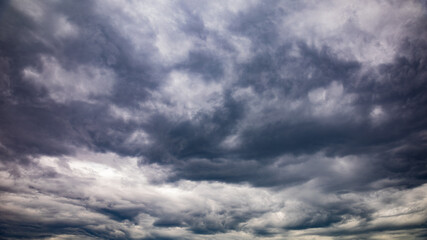 Dramatic clouds gather over the landscape