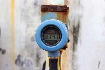 Industrial digital gauge reading 3.747 mm on display