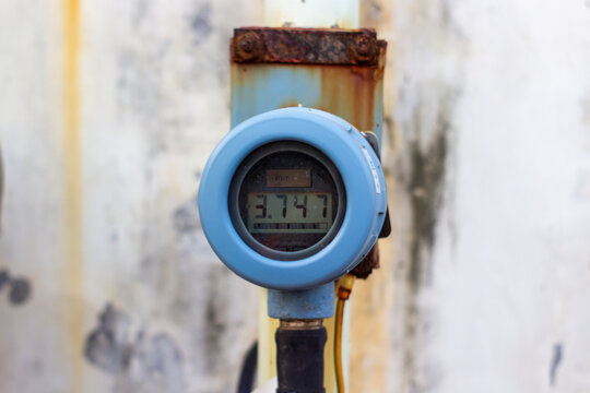 Industrial digital gauge reading 3.747 mm on display - Powered by Adobe