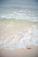 sea waves on the beach sand, foam