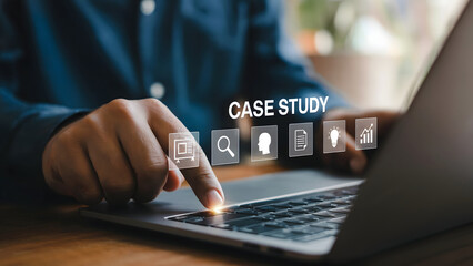Man using laptop for case study research with data analysis icons, professional business solution and strategy, modern digital workflow efficiency
