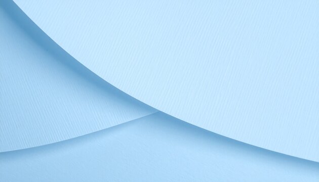 Light blue paper with soft waves on bottom edge, clean abstract texture perfect for modern design uses.