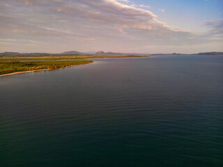 Aerial Drone View of Tropical Queensland Beach, Ocean Waves, Island Coastline and Shoreline – Scenic Coastal Landscape, Clear Blue Water, Australia Nature, Travel, Tourism, QLD