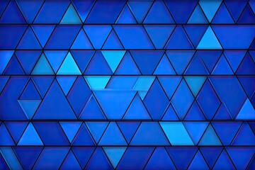 Abstract geometric pattern of varying shades of blue triangles