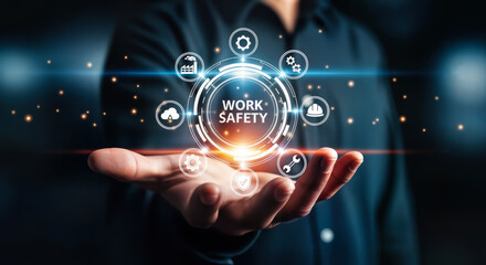 Work safety concept with icons representing protection, health, and risk management, held in a persons hand, symbolizing corporate responsibility and employee wellbeing in an industrial setting