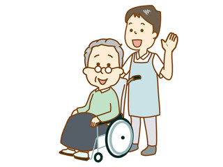 福祉、車いすの男性を介助する介護士
