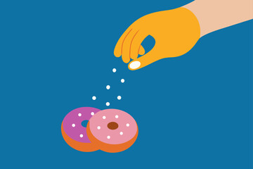 Fototapeta premium hand-sprinkling-sugar-on-top-of-donuts