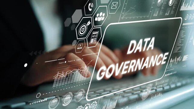 Business professional focused on data governance with digital interface and analytics metrics displayed on screen. Asymptotic smart data analytic. - Powered by Adobe