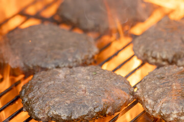 Hamburger patties on a grill