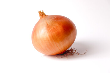 One fresh raw whole onion on a white background. Unpeeled onion.