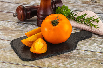 Organic juicy ripe yellow tomatoes