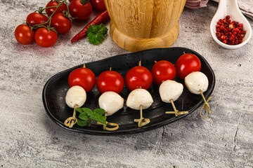 Mozzarella with cherry tomato canape