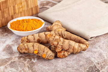 Fresh aroma tumeric roots heap