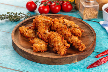 Golden crispy fried chicken strips