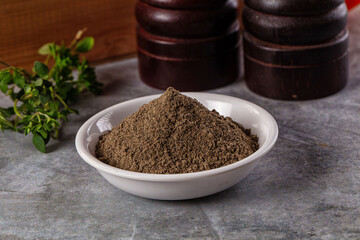 Ground dry black pepper powder