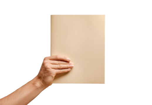 A light beige book held by a hand against a black background