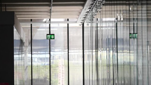 interior view of a building with exit signs
