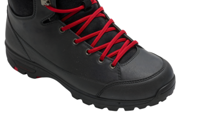 Closeup of black hiking boot with red laces on the transparent background highlighting durable outdoor footwear design and modern style