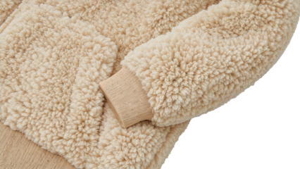 Closeup of beige sherpa fleece jacket sleeve with ribbed cuff on the transparent background for cozy winter fashion concepts