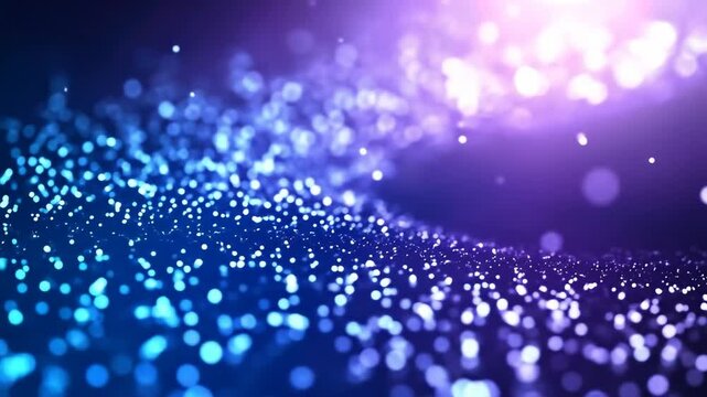 Abstract blurred glittering light particles stream against a gradiant blue-purple backdrop