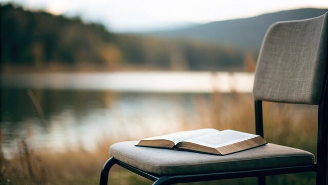 Bible resting beside an empty chair &mdash; inviting presence of God in quiet moments
