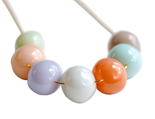 Close-up of a pastel-colored beaded necklace