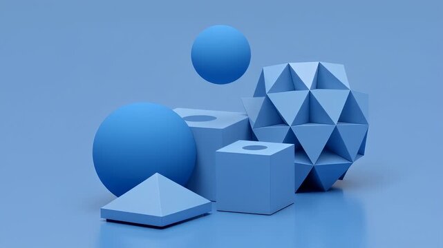 A collection of various geometric shapes in shades of blue, including spheres, cubes, a pyramid, and a complex polyhedral form.
