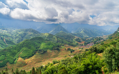 Panoramic View of Lush Green Rice Terraces and Mountains near Sapa Village, Vietnam