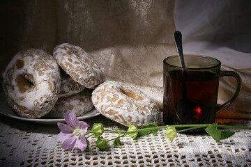 Tea still life with gingerbread rings