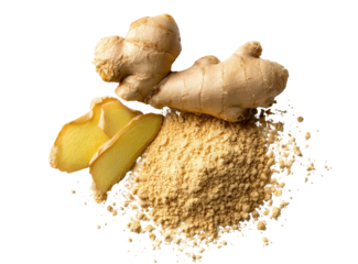 Fresh ginger root and ground ginger.  A pile of light beige ground ginger powder rests on a black background, with pieces of fresh ginger root atop and beside it