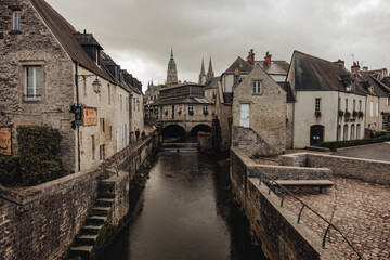 Obraz premium Historic Center of Bayeux with River Aure and Cathedral in Normandy, France