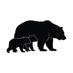 Fototapeta premium Silhouette of a mother bear and two cubs walking together