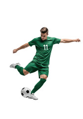 Obraz premium Young caucasian male athlete in dark green soccer uniform #11, powerfully kicking a ball with motion blur, intense focus, full body, isolated on transparent studio background with shadowless lighting,