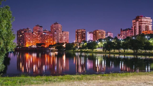 Night view of Krasnodar from the lake shore, time-lapse