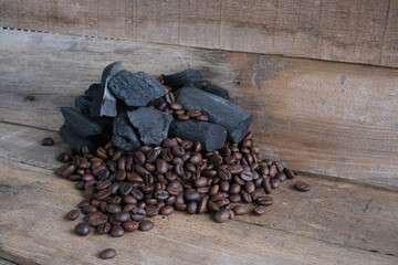 Coffee beans on a wooden background
