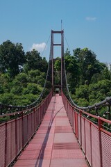 Red Suspension Bridge in Sarae hills on a Sunny Day